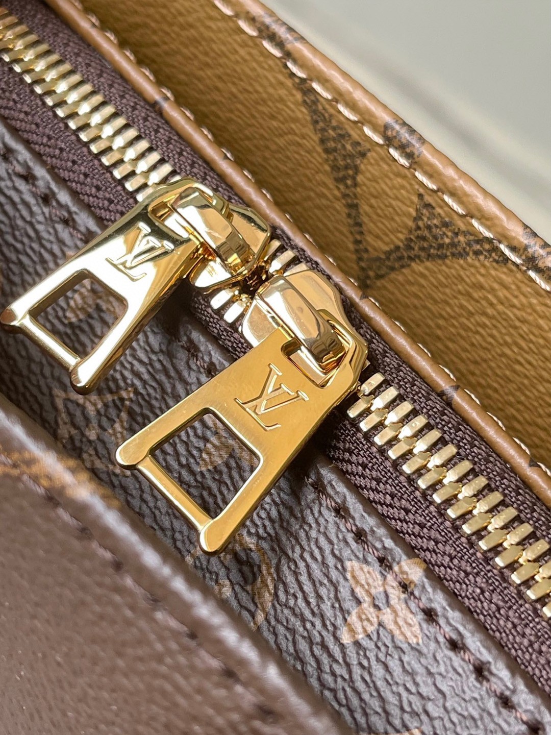 LV OnTheGo East West Bag In Monogram Reverse Canvas M46653