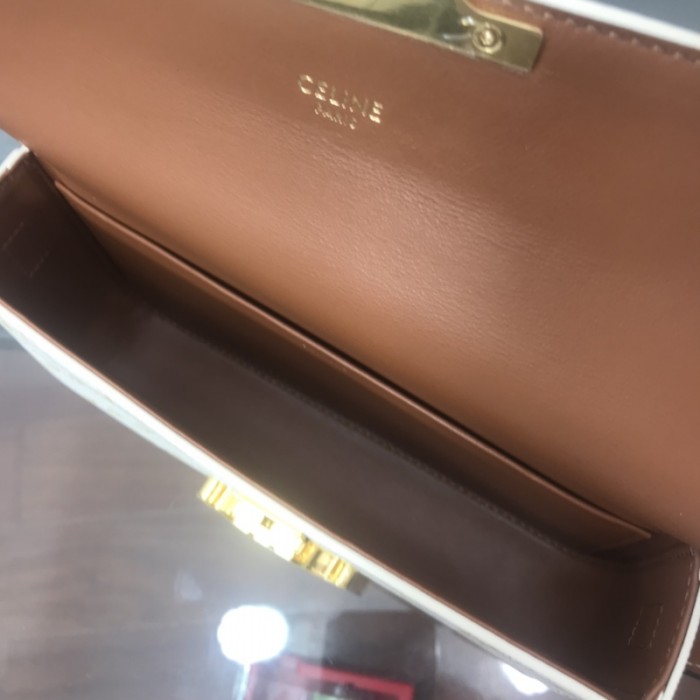 Ce**e shoulder bag triomphe in shiny calfskin and canvas