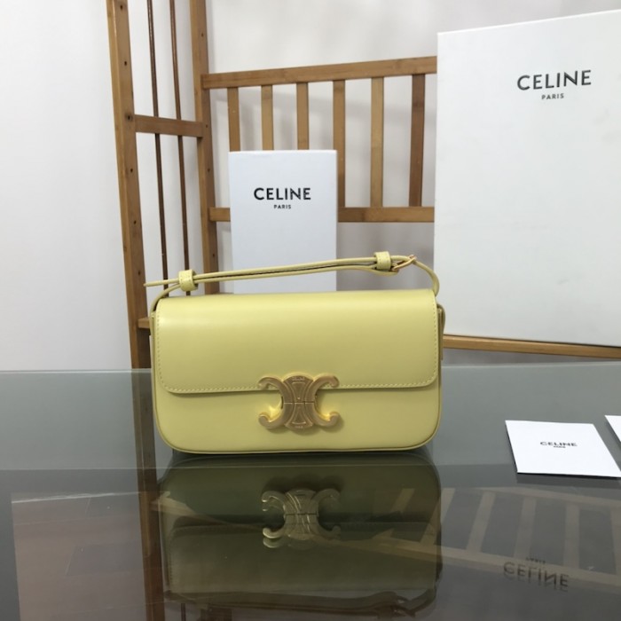 Ce**e shoulder bag triomphe in shiny calfskin yellow
