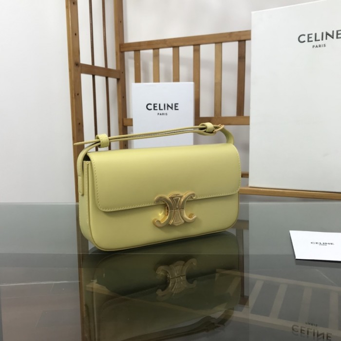 Ce**e shoulder bag triomphe in shiny calfskin yellow