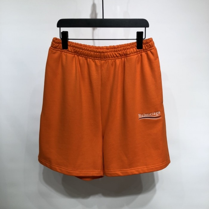 Ba*len*cia*ga men''s political campaign sweat shorts in orange
