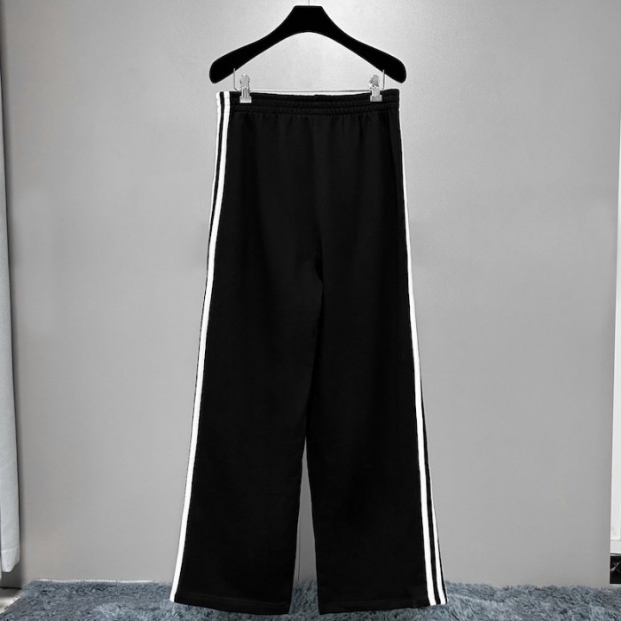 Ba*len*cia*ga / ad*s tailored pants in black
