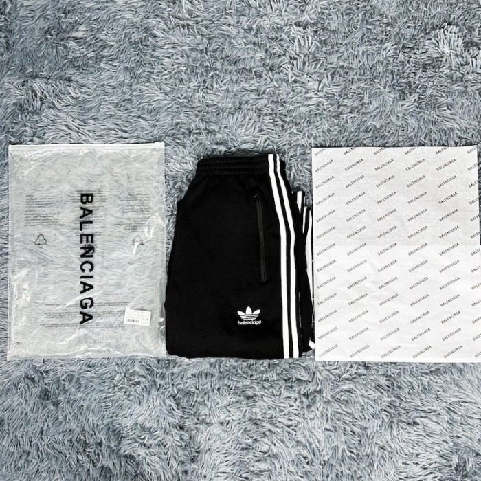 Ba*len*cia*ga / ad*s tailored pants in black