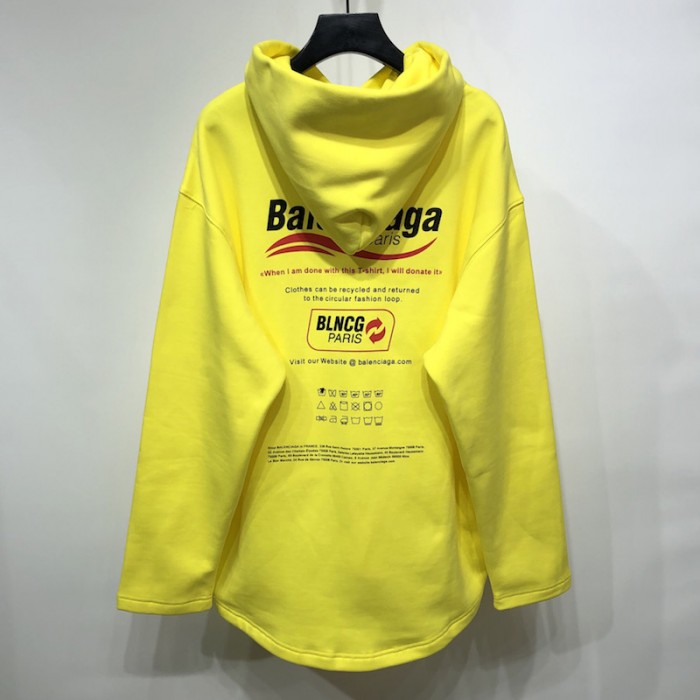 Ba*len*cia*ga dry cleaning hooded t-shirt in yellow