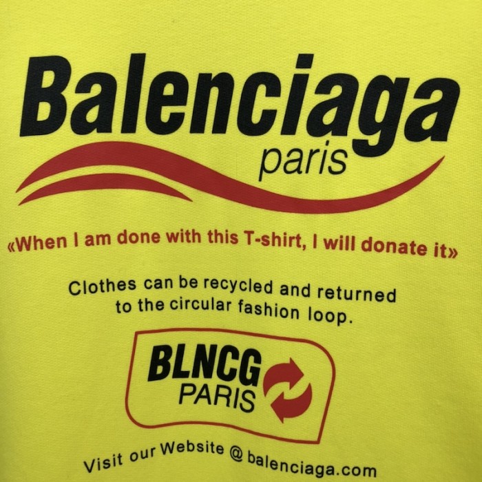 Ba*len*cia*ga dry cleaning hooded t-shirt in yellow