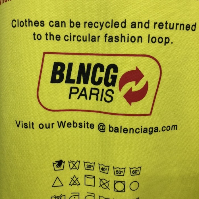 Ba*len*cia*ga dry cleaning hooded t-shirt in yellow