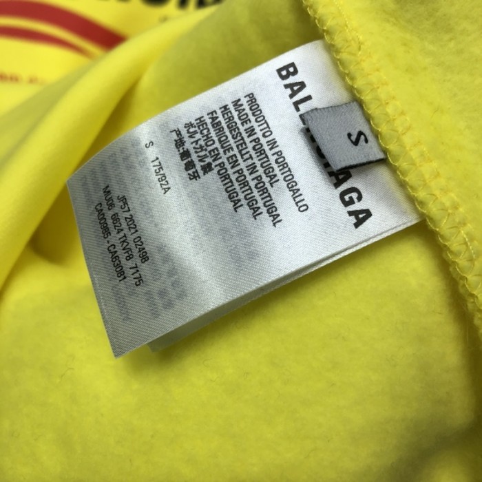 Ba*len*cia*ga dry cleaning hooded t-shirt in yellow