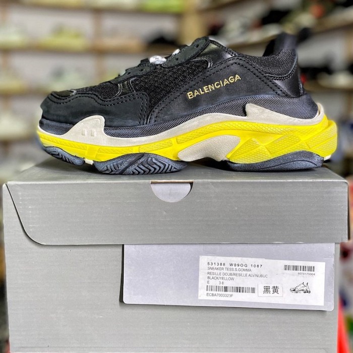 Ba*len*cia*ga triple s sneaker black / yellow