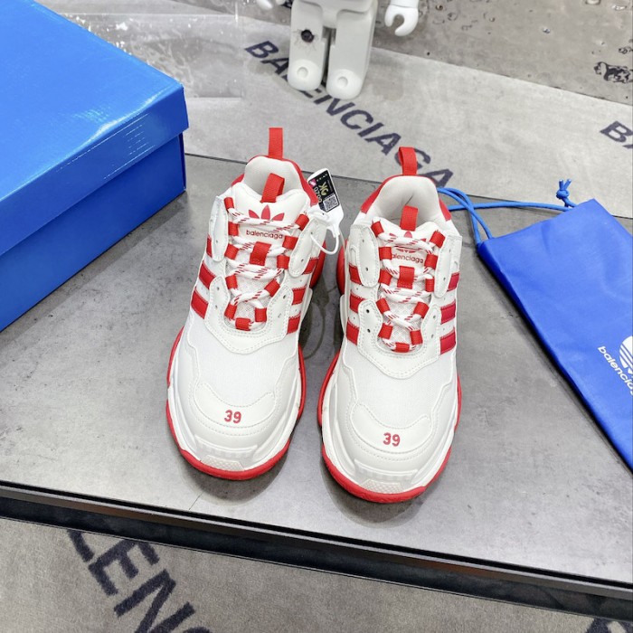 Ba*len*cia*ga / ad*s triple s sneaker in red