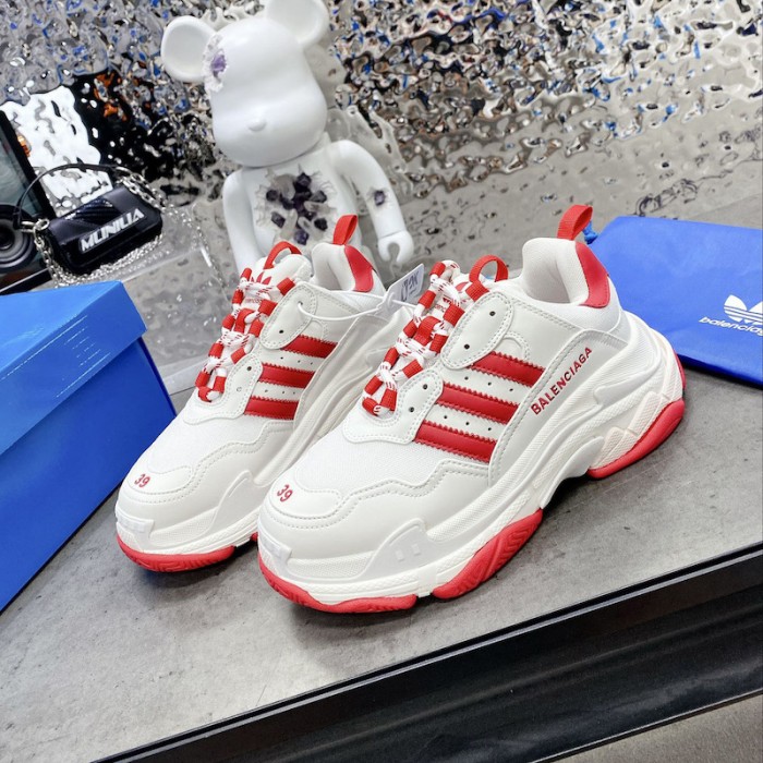 Ba*len*cia*ga / ad*s triple s sneaker in red