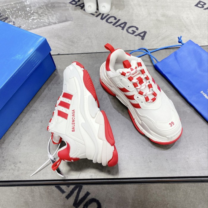 Ba*len*cia*ga / ad*s triple s sneaker in red
