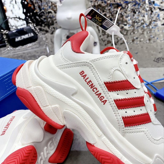 Ba*len*cia*ga / ad*s triple s sneaker in red