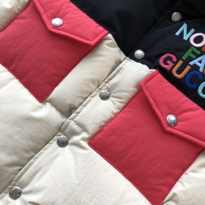 the north face x G*u*i down vest cream