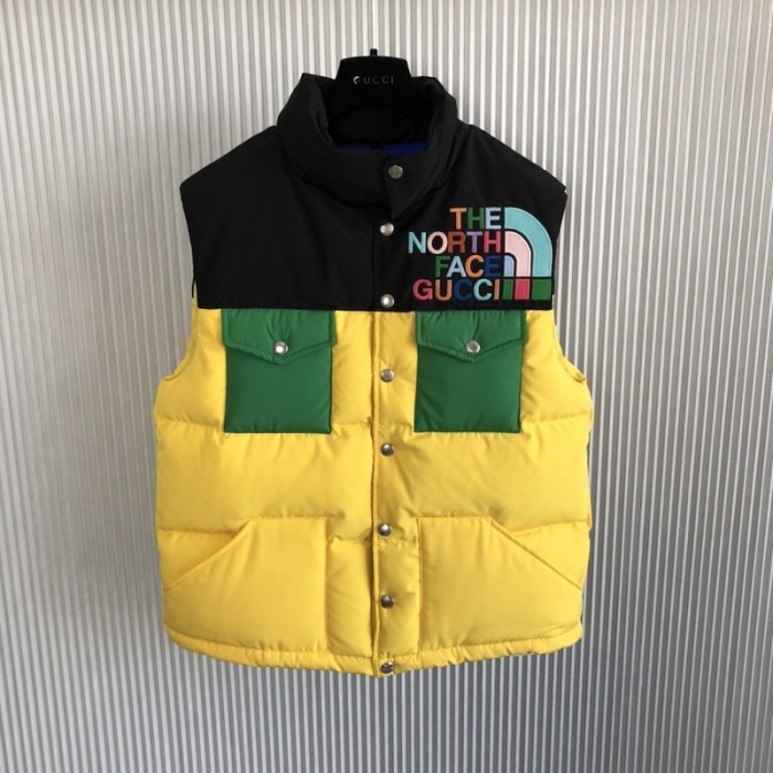the north face x G*u*i down vest yellow