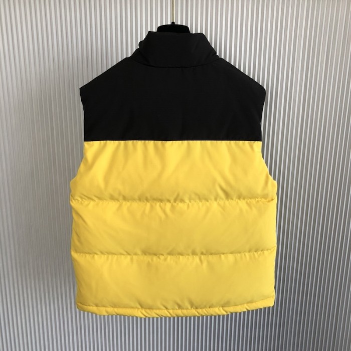 the north face x G*u*i down vest yellow