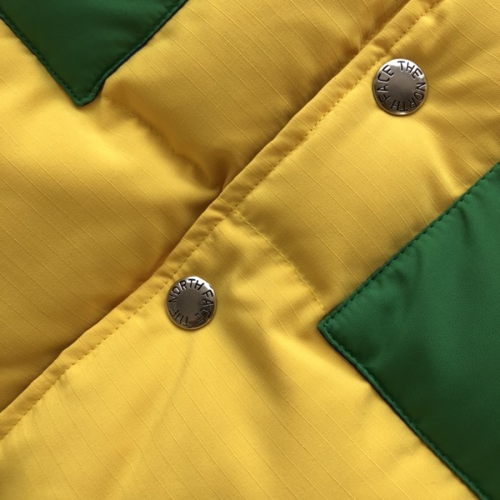 the north face x G*u*i down vest yellow