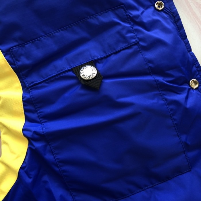 the north face x G*u*i down vest yellow