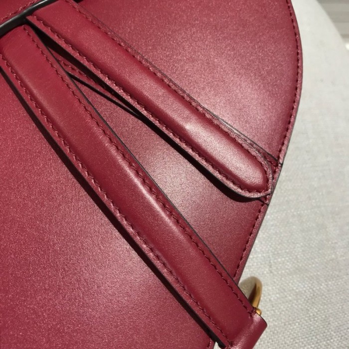 D*or saddle calfskin bag red