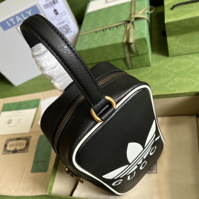 Ad*s x g*u*i mini top handle bag black