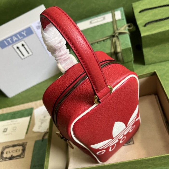 Ad*s x g*u*i mini top handle bag red