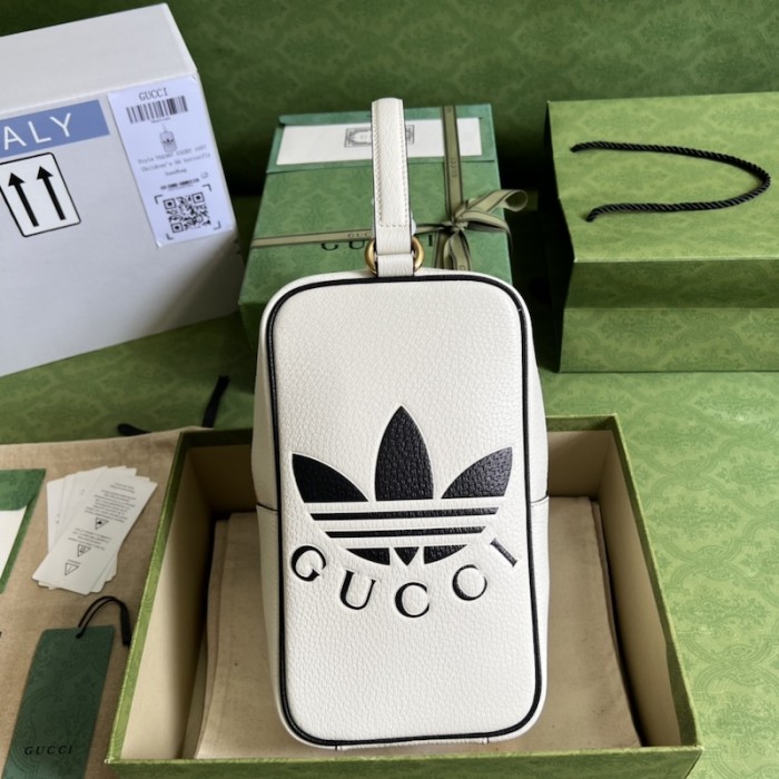 Ad*s x g*u*i mini top handle bag white