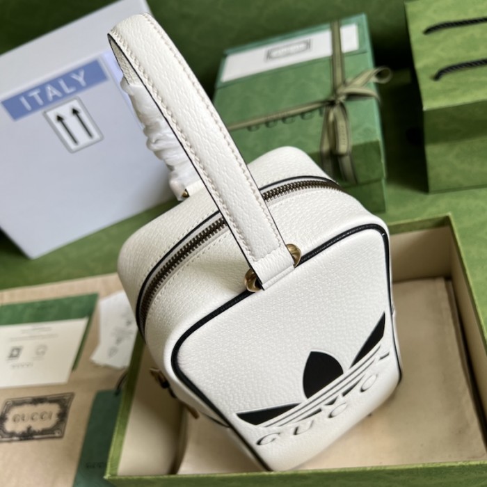 Ad*s x g*u*i mini top handle bag white