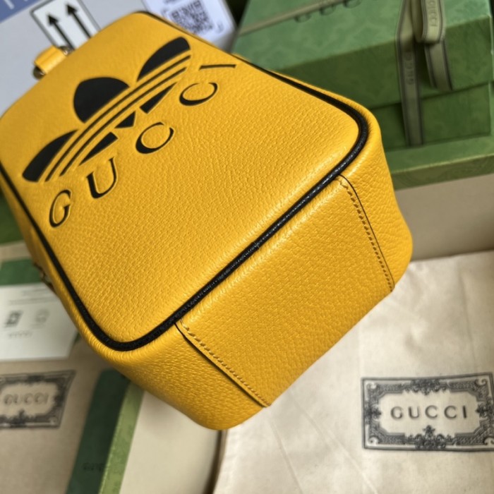 Ad*s x g*u*i mini top handle bag yellow