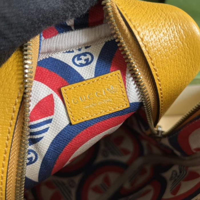 Ad*s x g*u*i mini top handle bag yellow