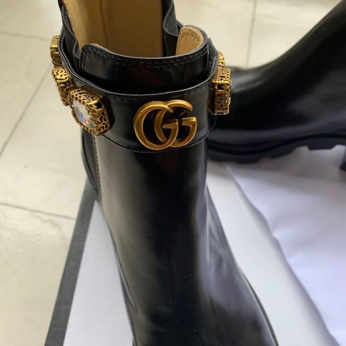 G*u*i leather ankle boot with belt black