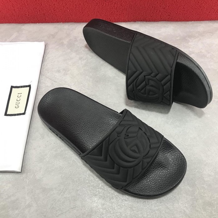 G*u*i matelasse rubber slide sandals black