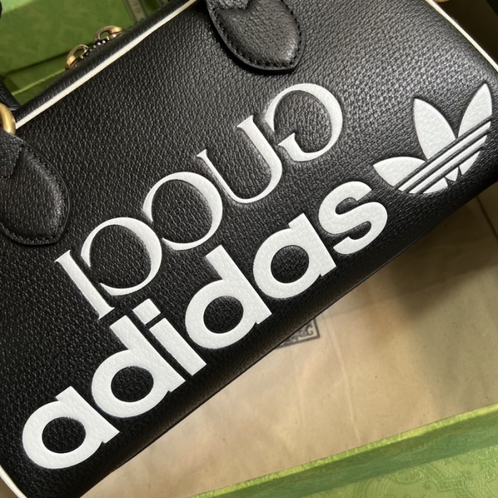 Ad*s x g*u*i mini duffle bag 702397 black