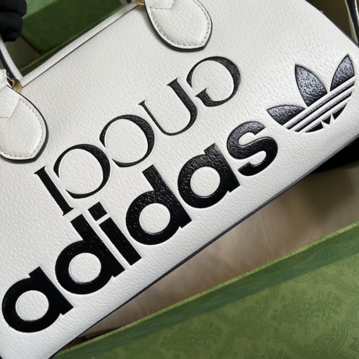 Ad*s x g*u*i mini duffle bag 702397 white