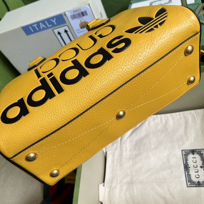 Ad*s x g*u*i mini duffle bag 702397 yellow