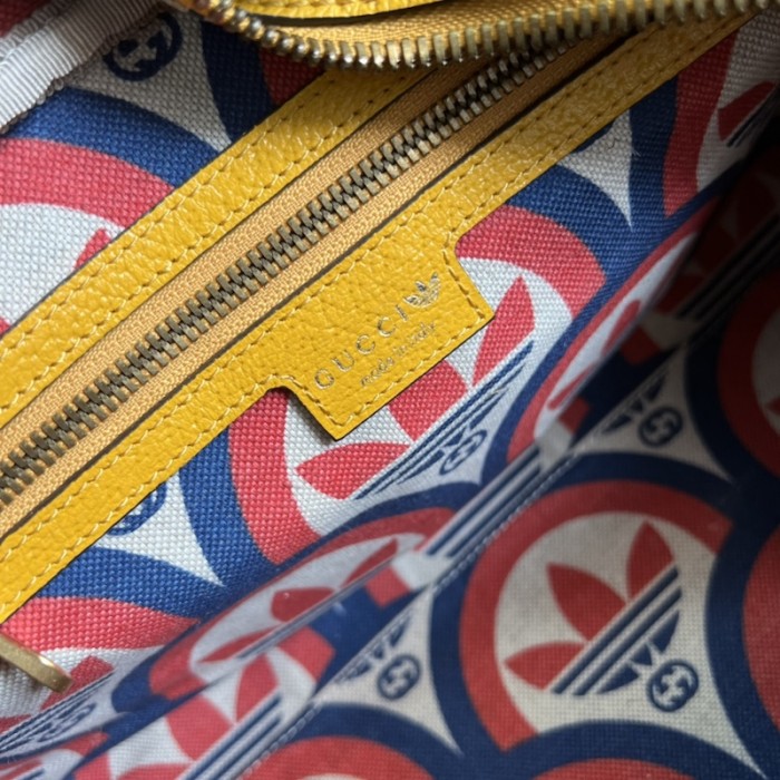 Ad*s x g*u*i mini duffle bag 702397 yellow
