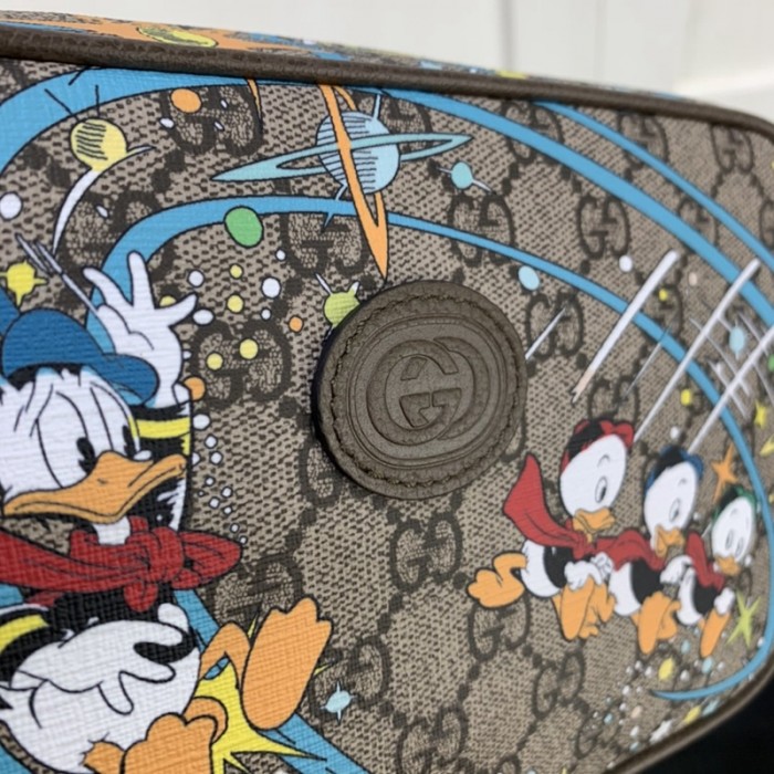 G*u*i donald duck print belt bag 602695
