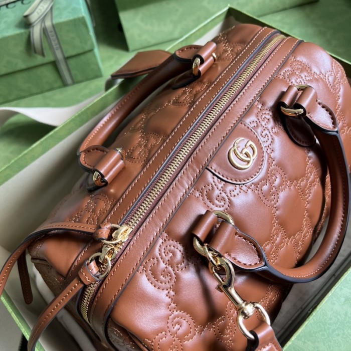 G*u*i gg matelassé leather top handle bag brown 702242