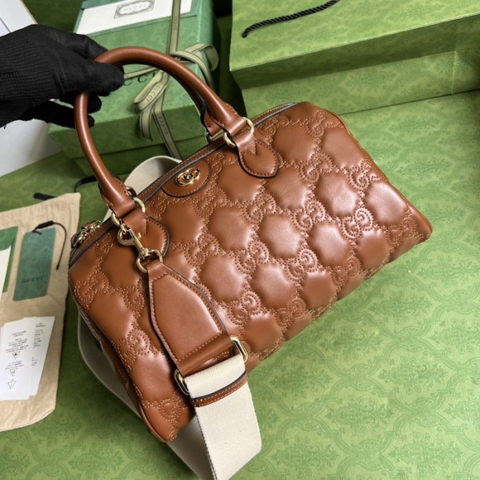 G*u*i gg matelassé leather top handle bag brown 702242