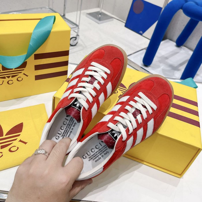 Ad*s x g*u*i gazelle sneaker red
