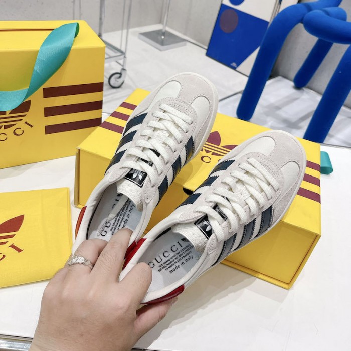 Ad*s x g*u*i gazelle sneaker white