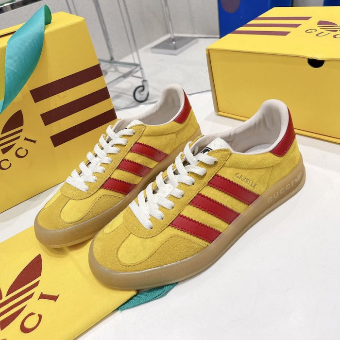Ad*s x g*u*i gazelle sneaker yellow