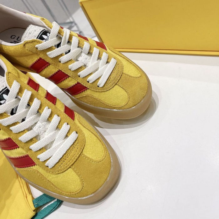Ad*s x g*u*i gazelle sneaker yellow