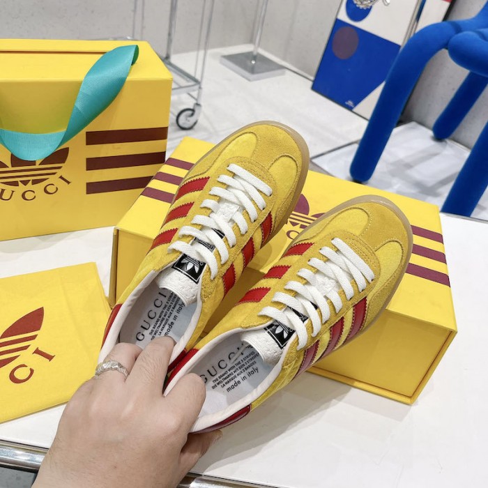 Ad*s x g*u*i gazelle sneaker yellow