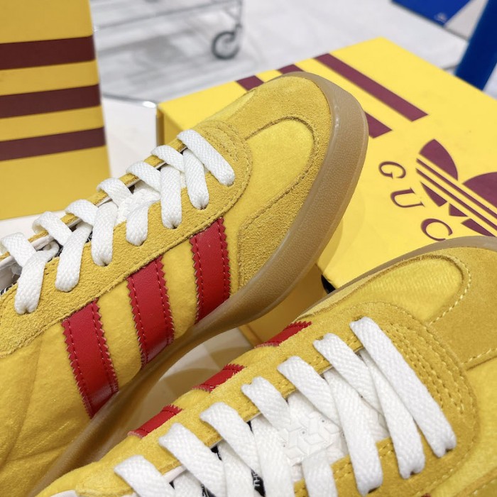 Ad*s x g*u*i gazelle sneaker yellow