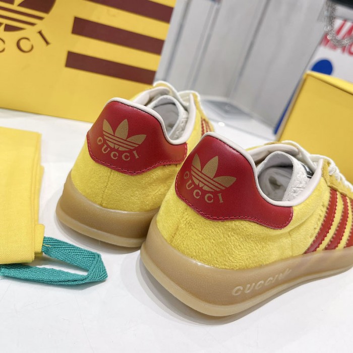 Ad*s x g*u*i gazelle sneaker yellow
