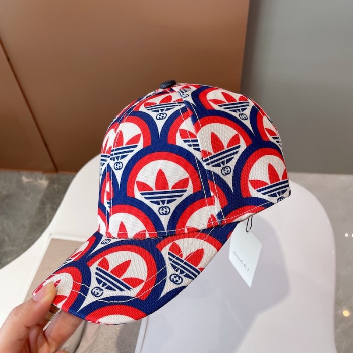 Ad*s x g*u*i trefoil print baseball hat 696485