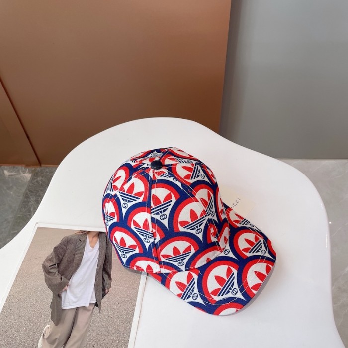 Ad*s x g*u*i trefoil print baseball hat 696485