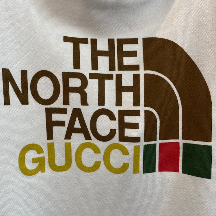 G*u*i x the north face hoodie off white