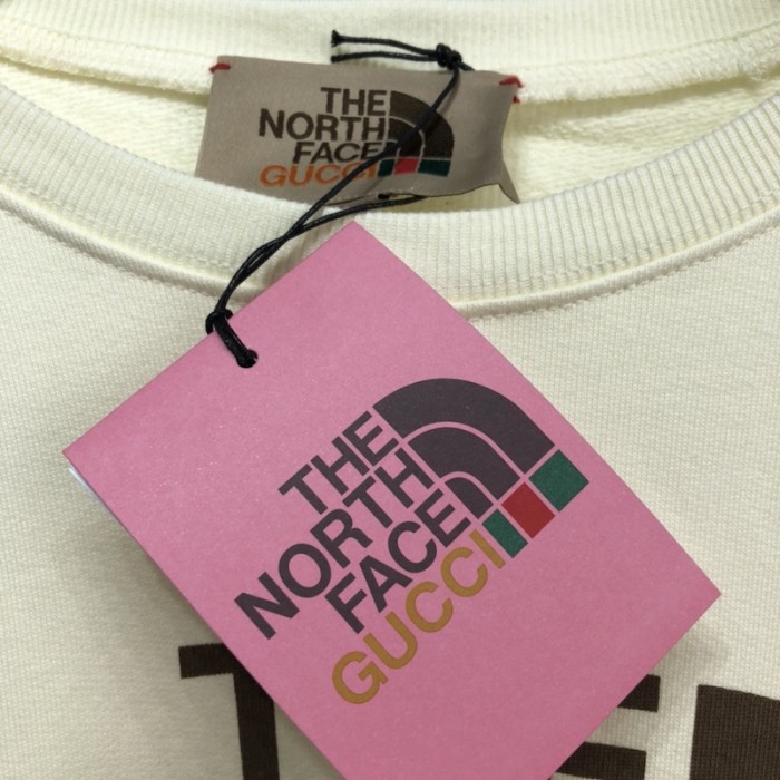 G*u*i x the north face sweatershirt cream