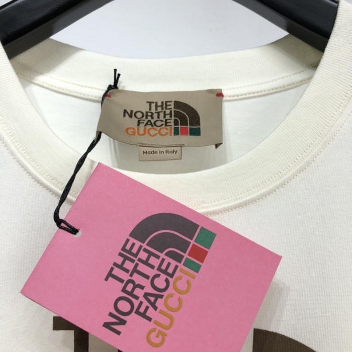 G*u*i x the north face t shirt cream