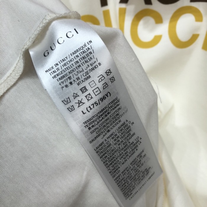G*u*i x the north face t shirt cream